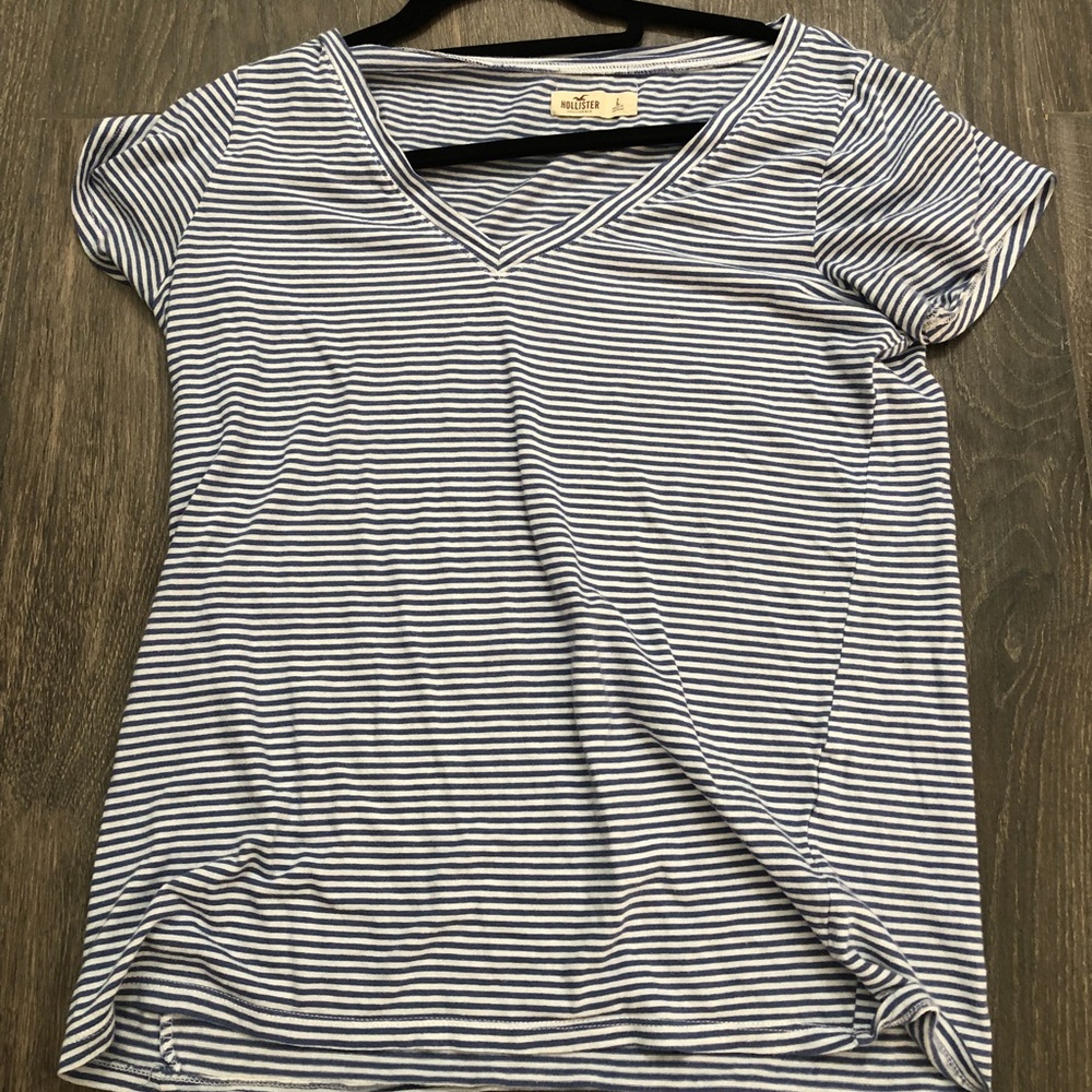 Navy blue striped Hollister v-neck t-shirt.